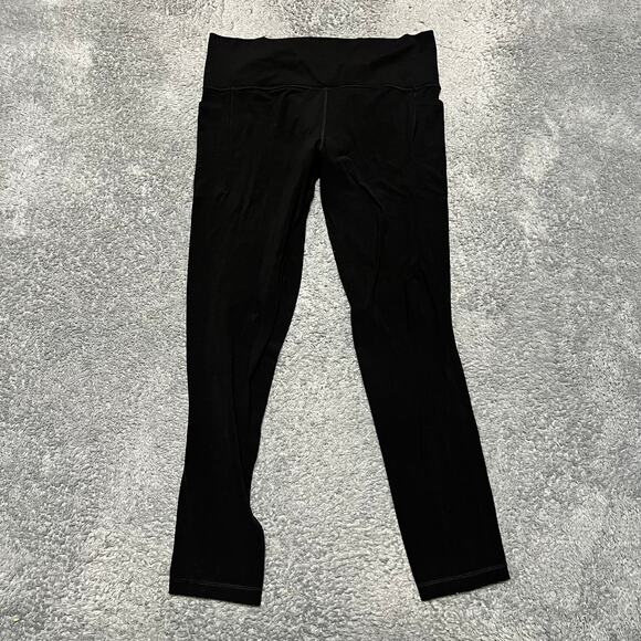 Athleta Pants - Athleta Leggings Pants Womens Large Black Salutation Stash Pocket
